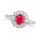 A RUBY AND DIAMOND RING in 18ct white gold and platinum, set with a cushion ruby of approximately...