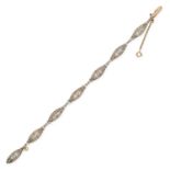 AN ANTIQUE SEED PEARL AND DIAMOND BRACELET in yellow gold and platinum, comprising a row of navet...