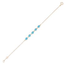 A RECONSTITUTED TURQUOISE BRACELET in 18ct yellow gold, comprising a trace chain set with five ov...
