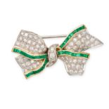A VINTAGE EMERALD AND DIAMOND BOW BROOCH in 18ct white and yellow gold, designed as a ribbon tied...