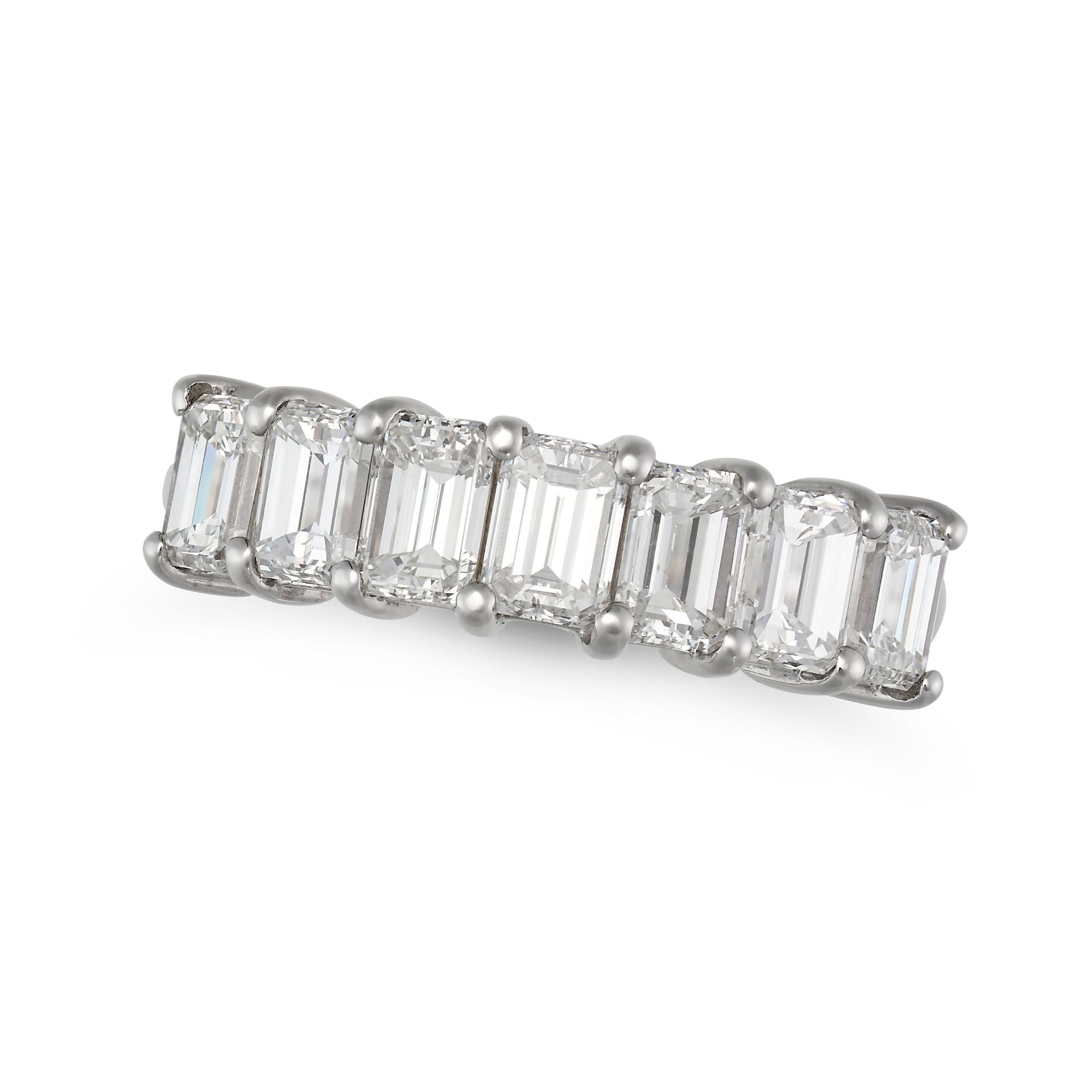 A DIAMOND HALF ETERNITY RING in 18ct white gold, half set with a row of emerald cut diamonds, the...