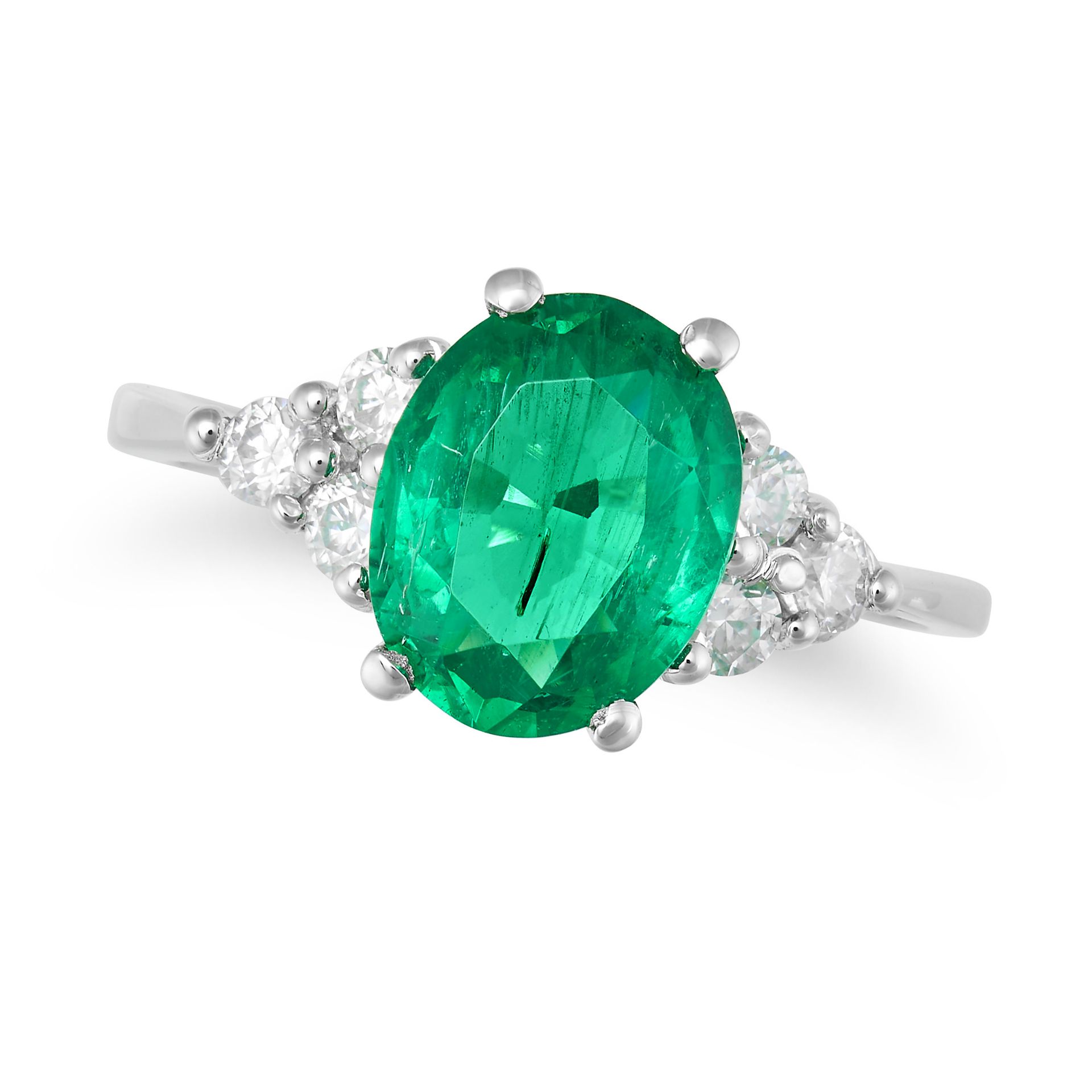 AN EMERALD AND DIAMOND RING in 18ct white gold, set with an oval cut emerald of approximately 2.4...