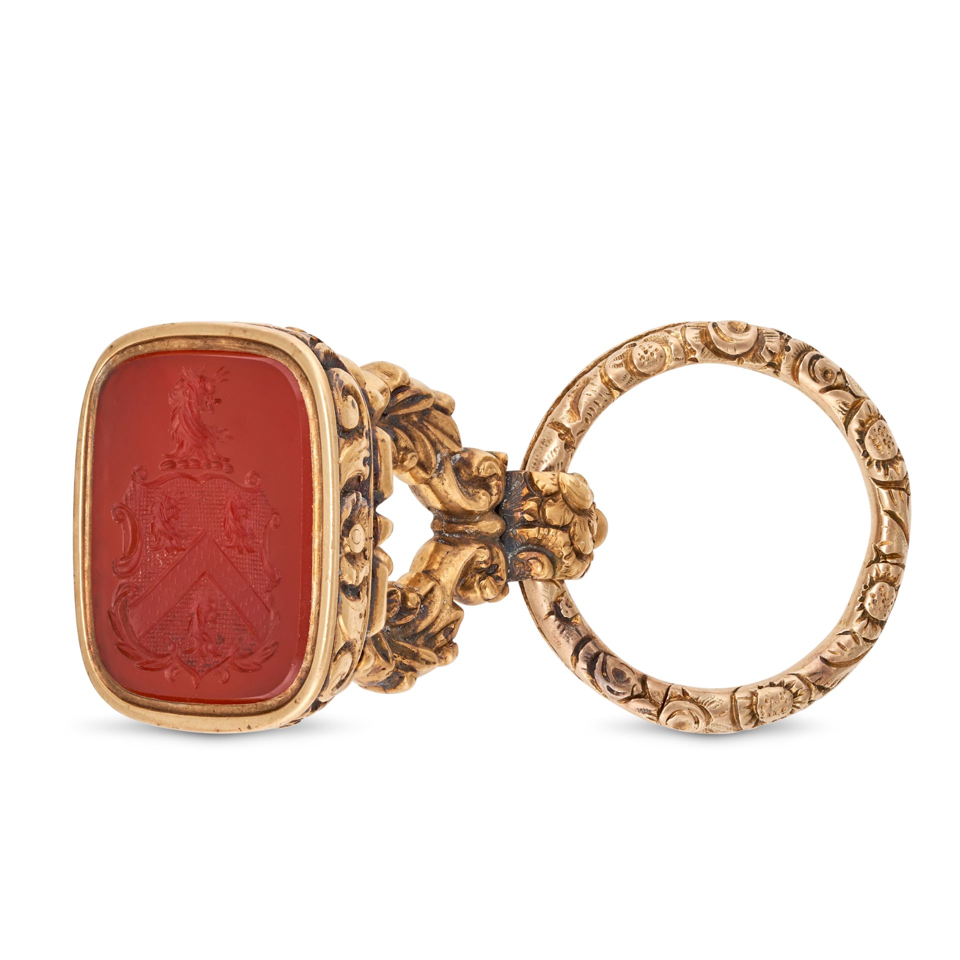 AN ANTIQUE INTAGLIO FOB SEAL set with a piece of carnelian carved to depict a coat of arms, suspe...