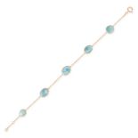 A LARIMAR BRACELET in 18ct yellow gold, comprising a trace chain set with oval and round cabochon...