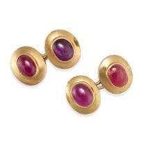 A PAIR OF RUBY CUFFLINKS in 18ct yellow gold, the oval faces set with oval cabochon rubies, stamp...