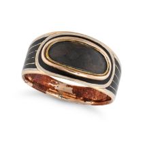 AN ANTIQUE ENAMEL MOURNING RING in yellow gold, set with an oval glass locket panel with hairwork...