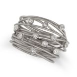 A DIAMOND DRESS RING in 18ct white gold, the stylised ring comprising white gold wires accented b...