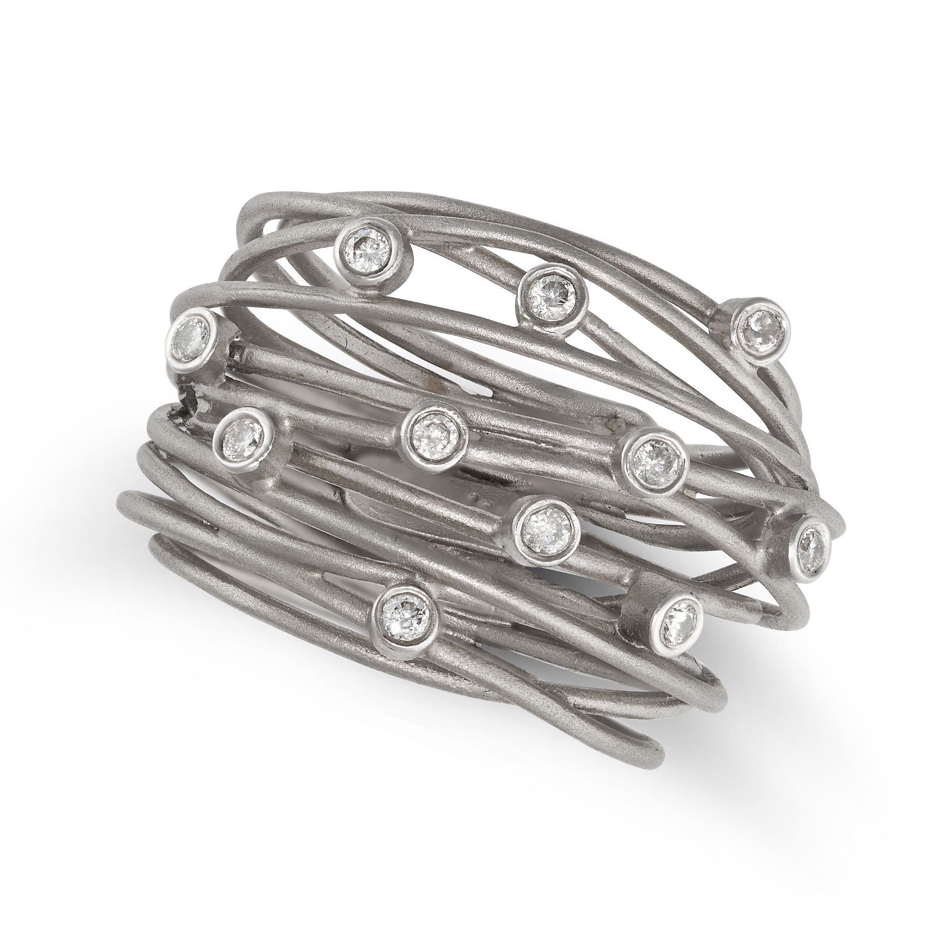 A DIAMOND DRESS RING in 18ct white gold, the stylised ring comprising white gold wires accented b...