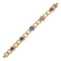 BOODLES, A TANZANITE AND DIAMOND BRACELET in 18ct yellow gold, comprising five octagonal links se...