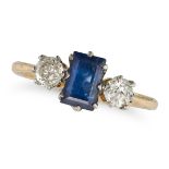 A SAPPHIRE AND DIAMOND THREE STONE RING in yellow gold, set with a rectangular step cut sapphire ...