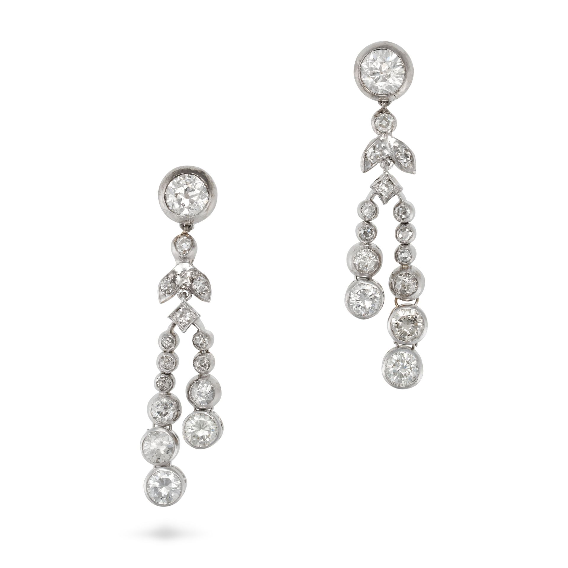 A PAIR OF DIAMOND DROP EARRINGS each set with a round brilliant cut diamond suspending two articu...