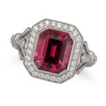 NO RESERVE - A PINK TOURMALINE AND DIAMOND RING in 18ct white gold, set with an octagonal step cu...