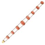 LE BOLT, A CORAL CHOKER NECKLACE in 14ct yellow gold, set with a row of eight coral cabochons con...