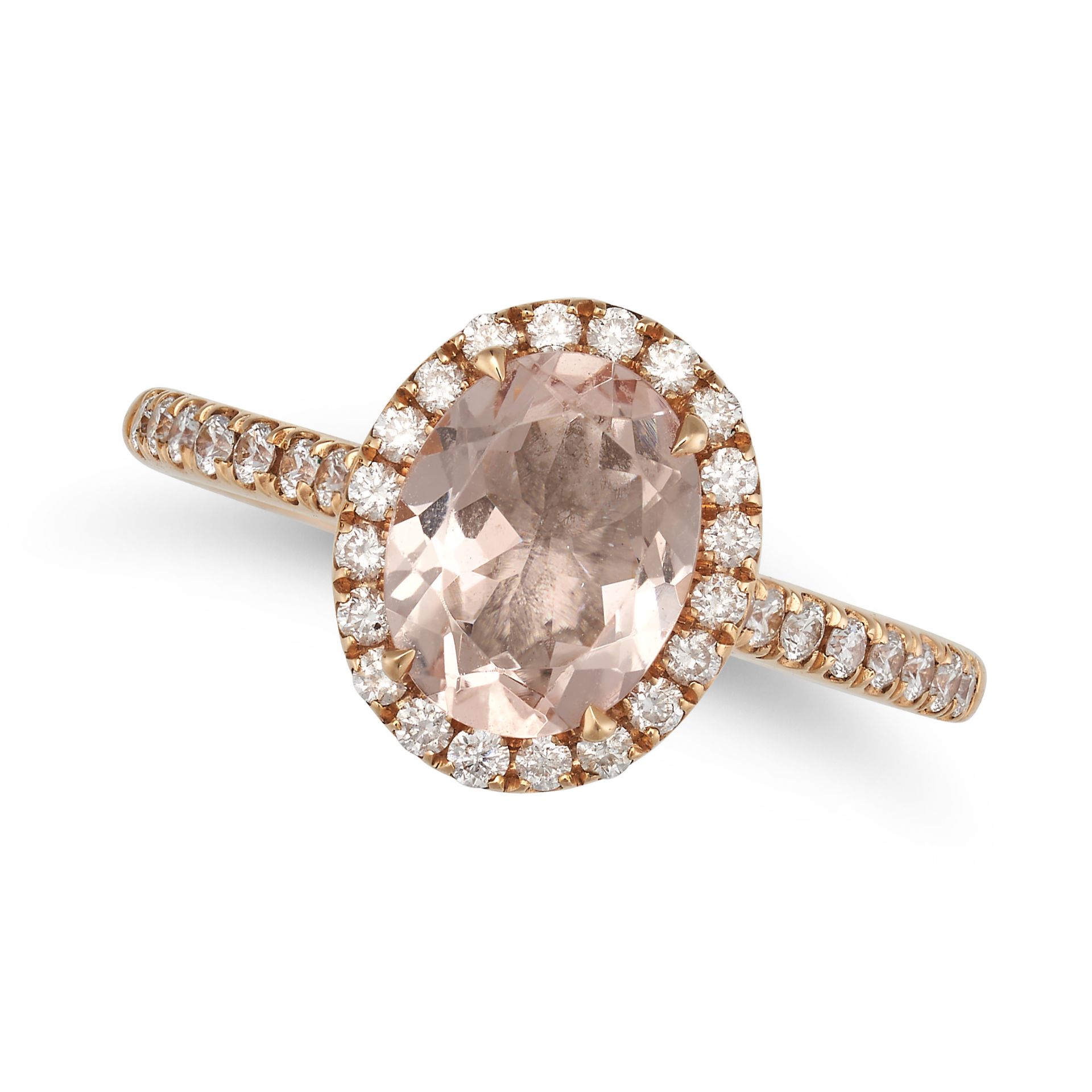 NO RESERVE - A MORGANITE AND DIAMOND HALO RING in yellow gold, set with an oval cut morganite of ...