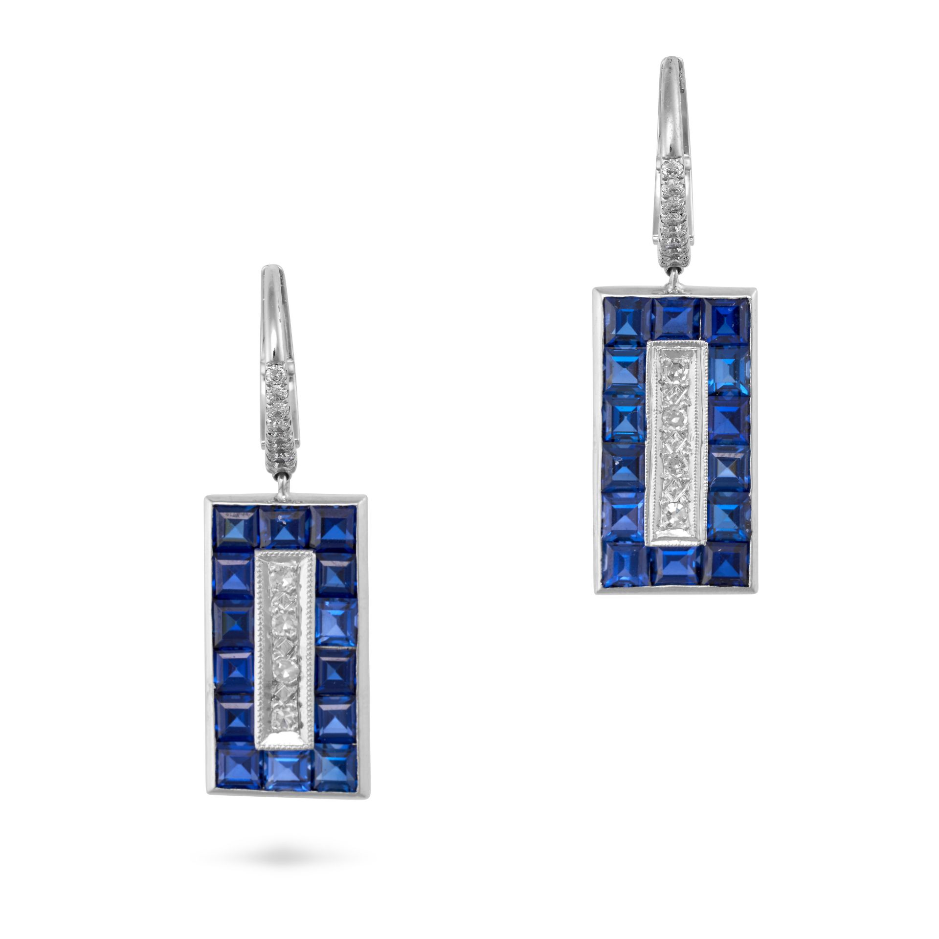 A PAIR OF SYNTHETIC SAPPHIRE AND DIAMOND DROP EARRINGS in 14ct white gold, each comprising a diam...