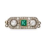 AN ANTIQUE EMERALD AND DIAMOND CLASP in yellow and white gold, set with a square step cut emerald...
