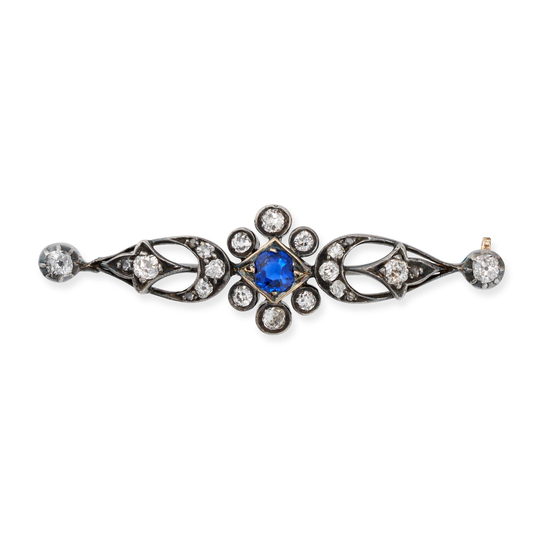 AN ANTIQUE SAPPHIRE AND DIAMOND BAR BROOCH in silver, set with a cushion cut sapphire accented by...