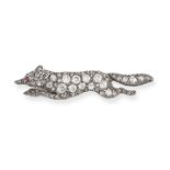 AN ANTIQUE VICTORIAN DIAMOND AND RUBY FOX BROOCH in yellow gold and silver, designed as a running...