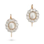 A PAIR OF NATURAL SALTWATER PEARL AND DIAMOND CLUSTER EARRINGS in yellow gold, each set with a ha...