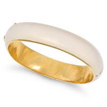CUSI, A VINTAGE ENAMEL BANGLE in 18ct yellow gold, the hinged body decorated with pearlescent gui...
