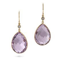 A PAIR OF AMETHYST AND DIAMOND EARRINGS in 18ct yellow gold, each set with a round brilliant cut ...