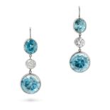 A PAIR OF BLUE ZIRCON AND DIAMOND DROP EARRINGS in white gold, each comprising an oval cut blue z...