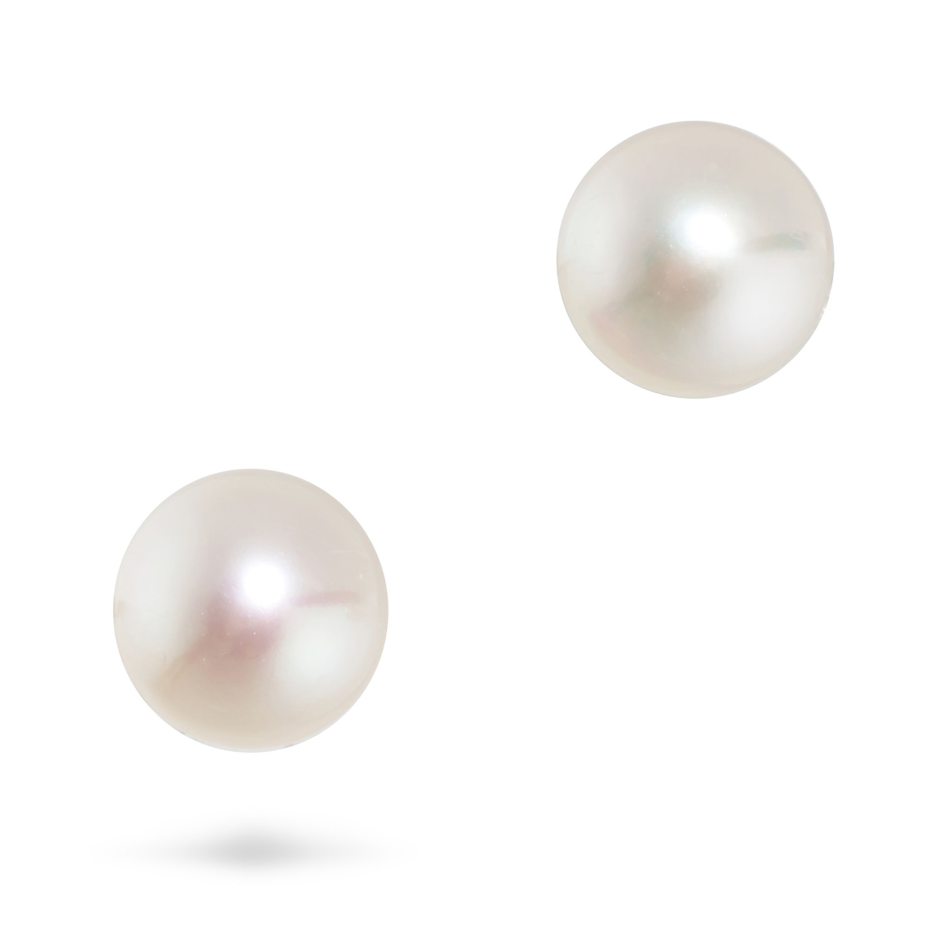 A PAIR OF NATURAL SALTWATER PEARL STUD EARRINGS in white gold, each set with a pearl of 9.5mm and...