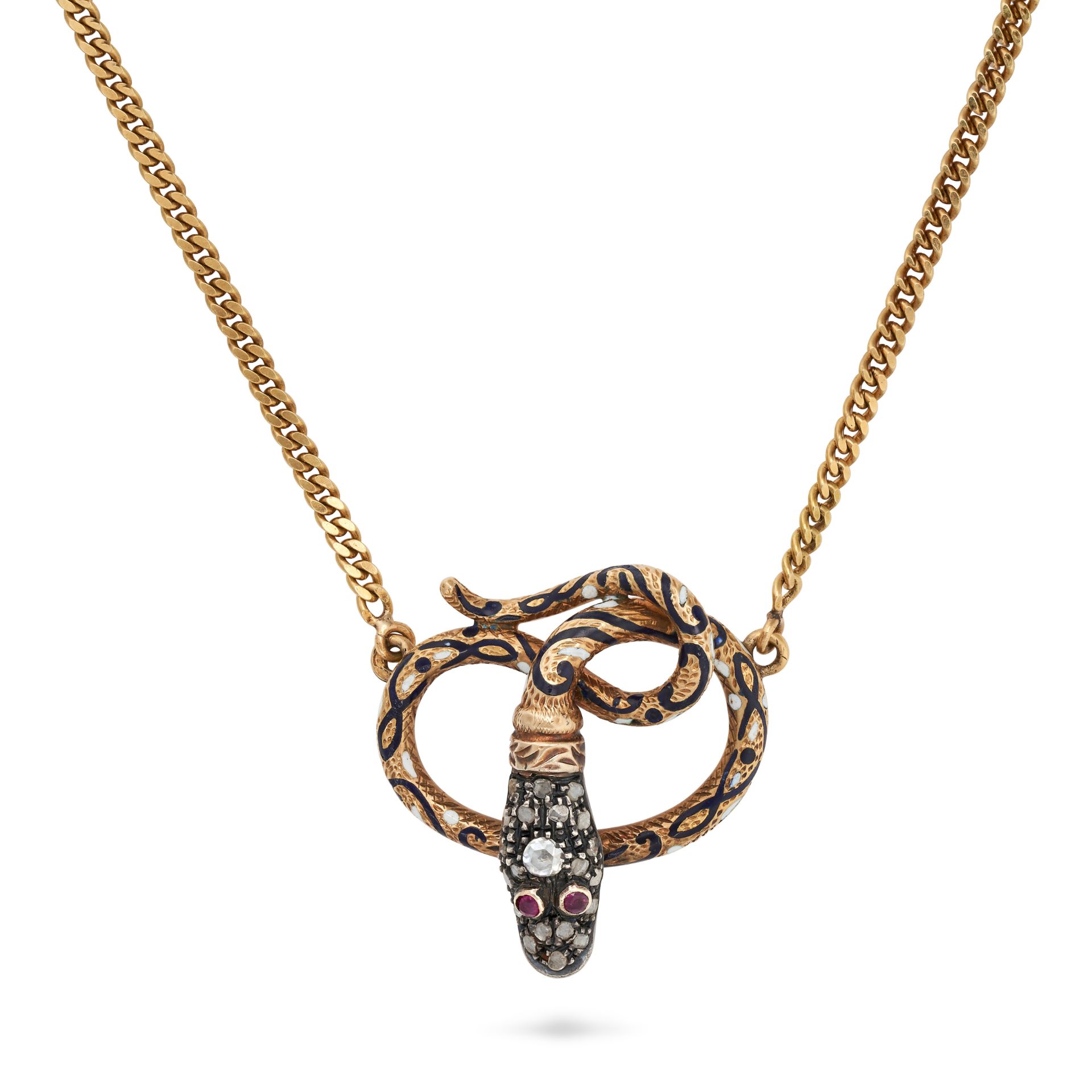 A DIAMOND, RUBY AN ENAMEL SNAKE NECKLACE in yellow gold and silver, the pendant designed as a coi...