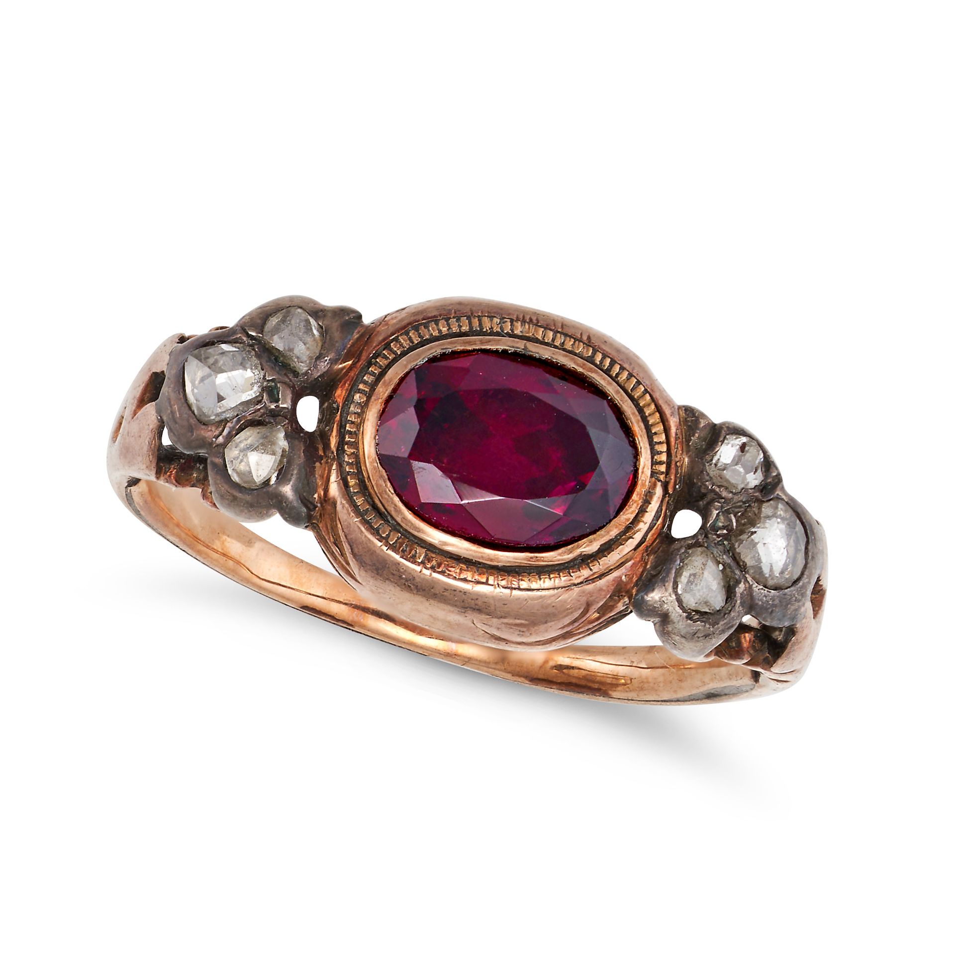 AN ANTIQUE GARNET AND DIAMOND RING in yellow gold and silver, set with an oval cut garnet accente...
