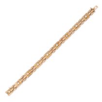 AN ANTIQUE EDWARDIAN PEARL GATE BRACELET in 15ct yellow gold, the gate link bracelet accented wit...