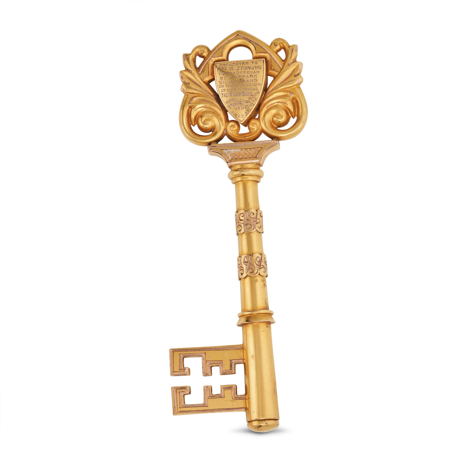 AN ANTIQUE CEREMONIAL GOLD KEY in 9ct yellow gold, engraved 'Presented to Mrs W. Jenkins YSTRADFE...