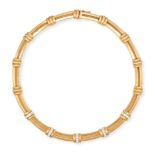TIFFANY &CO., A DIAMOND ATLAS NECKLACE in 18ct yellow gold, comprising a row of stylised links ac...