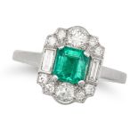 AN EMERALD AND DIAMOND CLUSTER RING in platinum, set with an octagonal step cut emerald of approx...