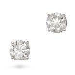 A PAIR OF DIAMOND STUD EARRINGS in 18ct white gold, each set with a round brilliant cut diamond o...