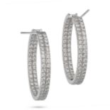 A PAIR OF DIAMOND HOOP EARRINGS in 18ct white gold, set inside and out with two rows of round bri...