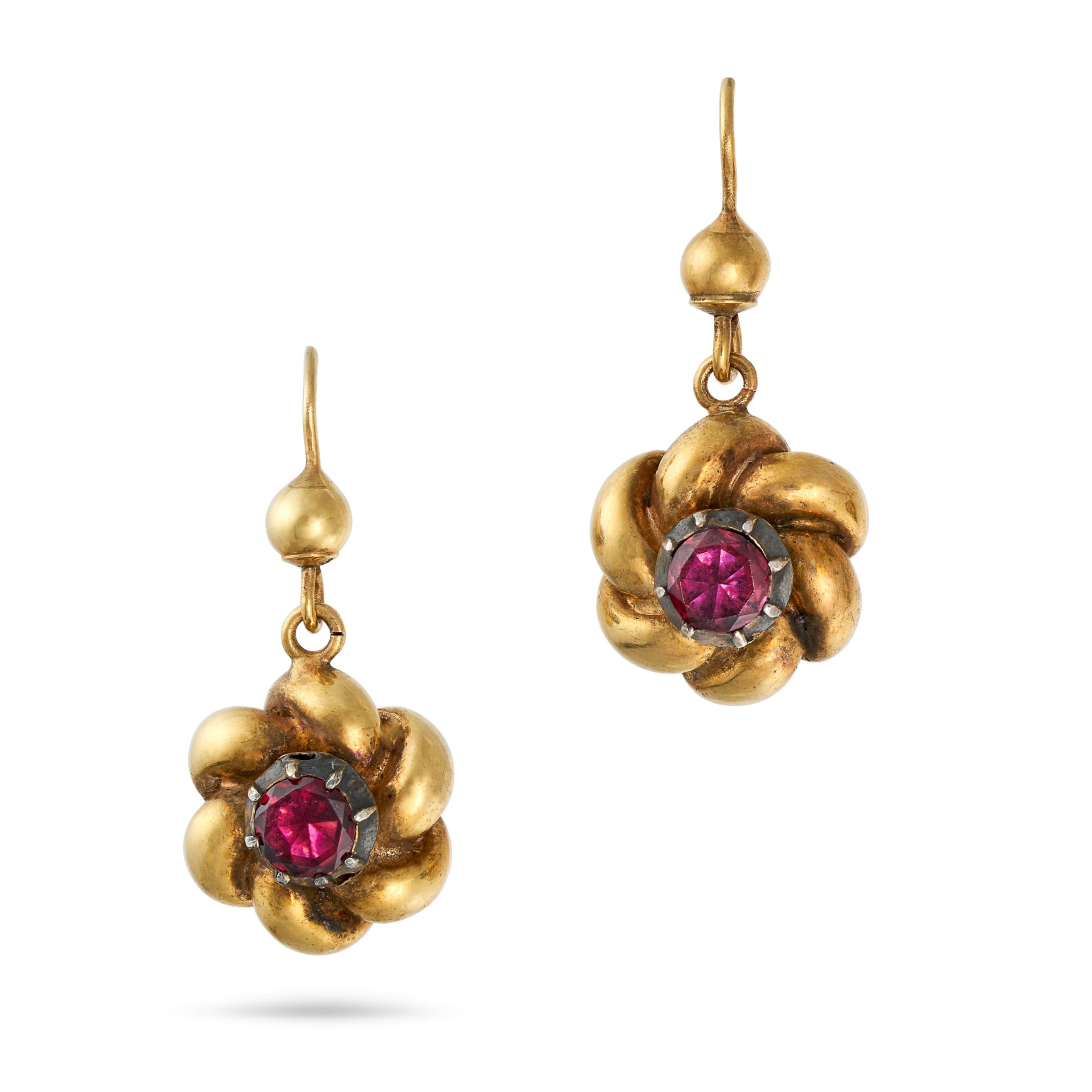 A PAIR OF ANTIQUE VICTORIAN GARNET EARRINGS in yellow gold, each earring set with a faceted garne...