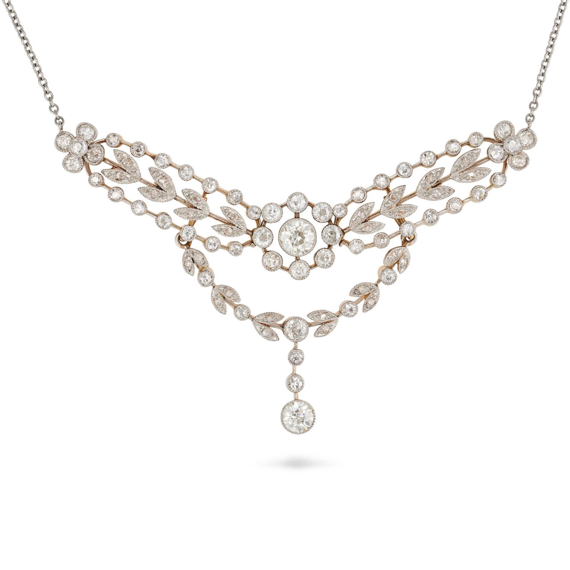 A DIAMOND NECKLACE in platinum and yellow gold, the Belle Epoque pendant set with old and rose cu...