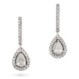 A PAIR OF DIAMOND DROP EARRINGS in white gold, each comprising a row of round cut diamonds suspen...