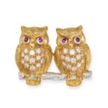 A RUBY AND DIAMOND OWL BROOCH in 18ct yellow and white gold, designed as two owls perched on a br...