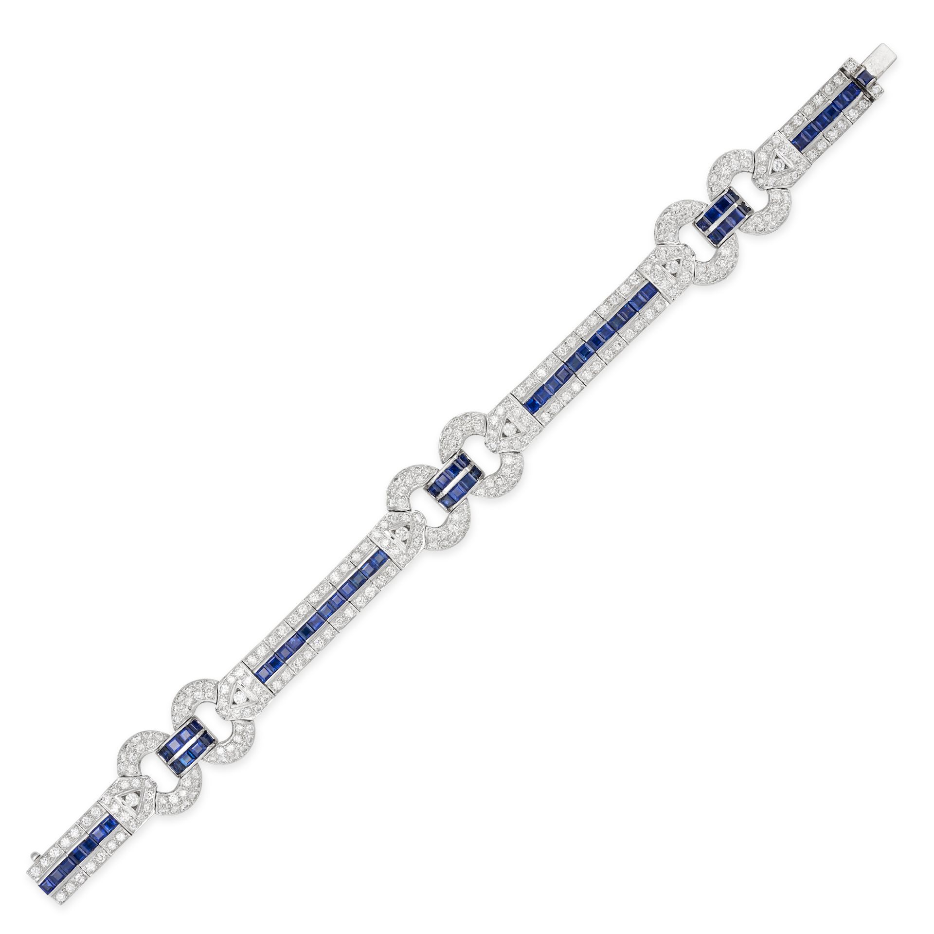 A SAPPHIRE AND DIAMOND BRACELET in 18ct white gold, set throughout with round brilliant cut diamo...