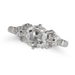 A SOLITAIRE DIAMOND RING in platinum, set with an old cut diamond of approximately 1.57 carats, a...