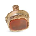 AN ANTIQUE CARNELIAN FOB SEAL engraved throughout with flowers, set with a blank carnelian seal, ...