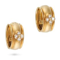 A PAIR OF DIAMOND HOOP EARRINGS in 18ct yellow gold, each set with a cluster of four round brilli...