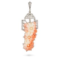 A CORAL AND DIAMOND PENDANT in 18ct white gold, set with carved coral flowers, accented by a fram...