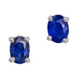 NO RESERVE - A PAIR OF SAPPHIRE STUD EARRINGS in 18ct white gold, each set with an oval cut sapph...