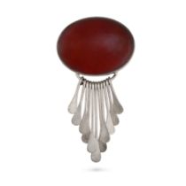 NO RESERVE - A CARNELIAN MEXICAN SILVER BROOCH in silver, set with an oval cabochon carnelian sus...