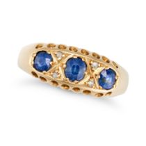 AN ANTIQUE SAPPHIRE AND DIAMOND RING in 18ct yellow gold, set with three cushion cut sapphires, a...