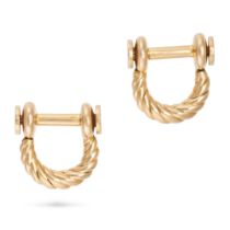 HERMES, A PAIR OF STIRRUP CUFFLINKS in 18ct yellow gold, designed as fluted stirrups, Gaetan de P...