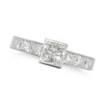 THEO FENNEL, A DIAMOND RING in platinum, set with a princess cut diamond of 1.04 carats, the band...