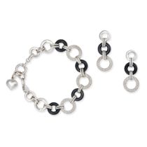 AN ONYX AND DIAMOND BRACELET AND EARRING SUITE in 18ct white gold, the bracelet comprising a row ...